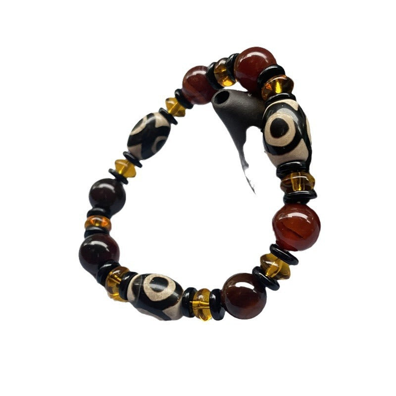 Tibetaanse Dzi-kralenarmband, Drie-oog