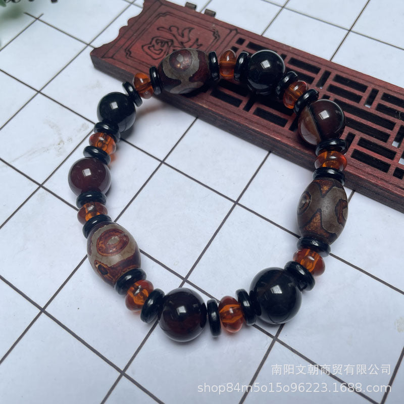 Tibetaanse Dzi-kralenarmband, Drie-oog