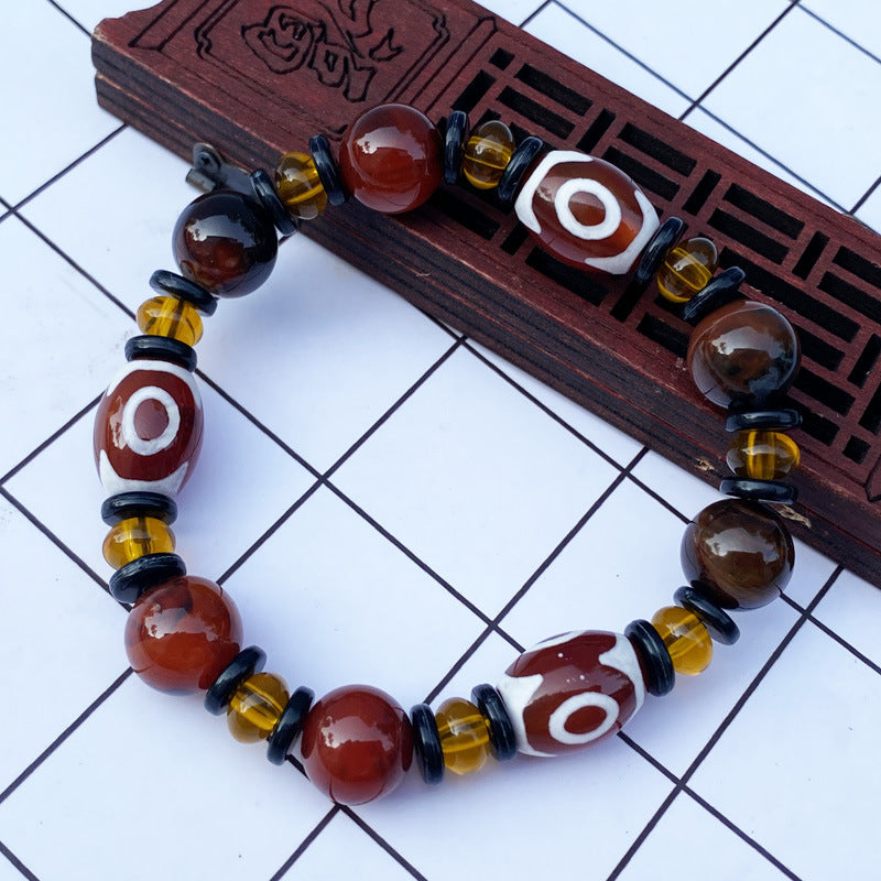 Tibetaanse Dzi-kralenarmband, Drie-oog