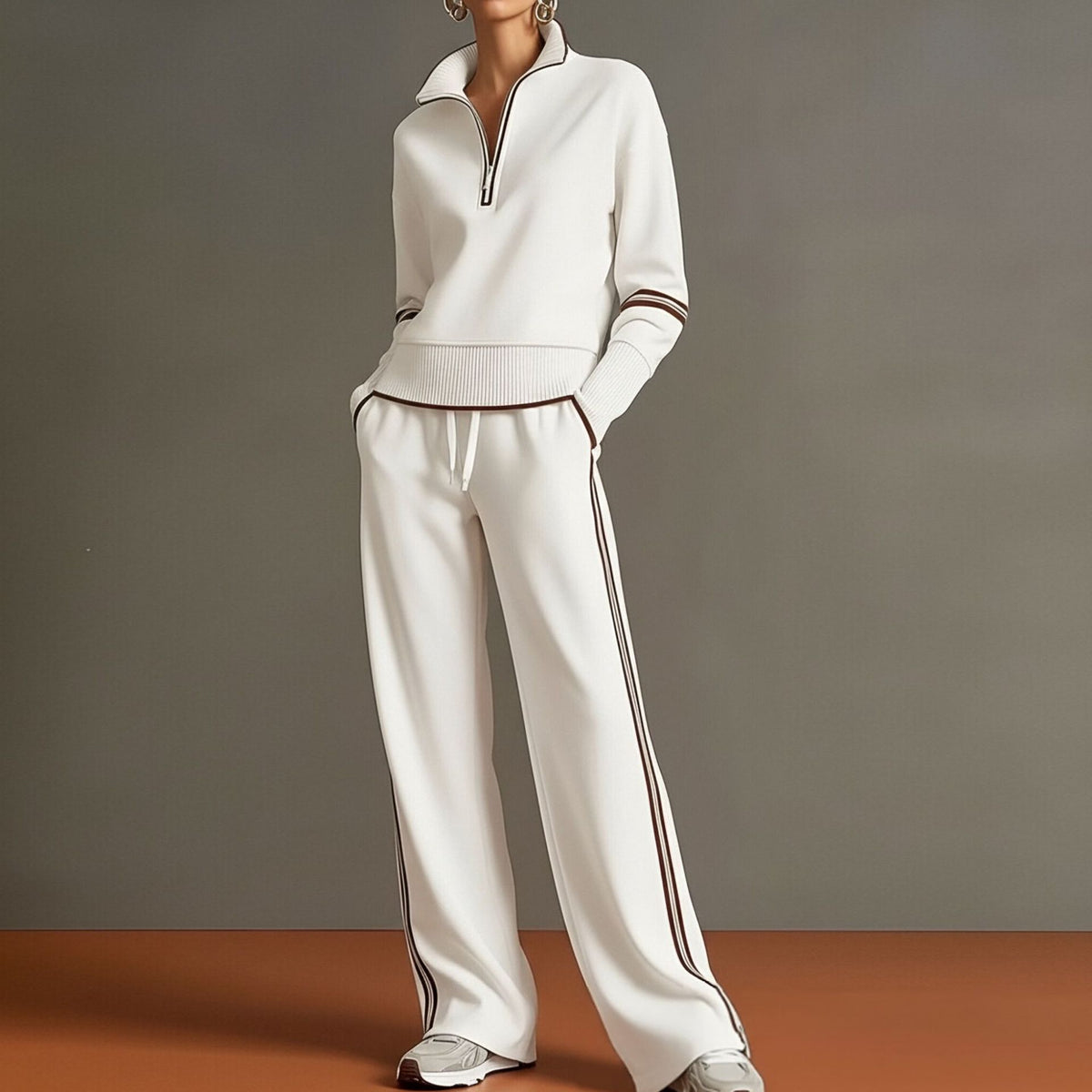 Conjunto de sudadera a rayas y pantalón de pierna ancha