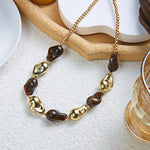 Collier mosaïque en résine géométrique irrégulière