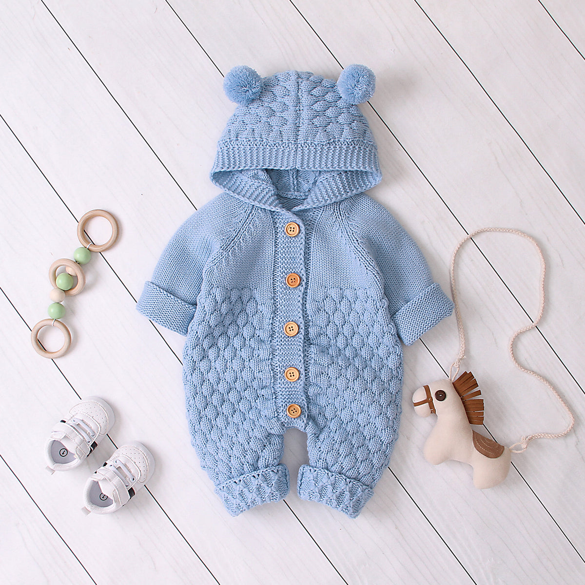 Combinaison en maille à capuche