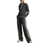 Conjunto de sudadera a rayas y pantalón de pierna ancha