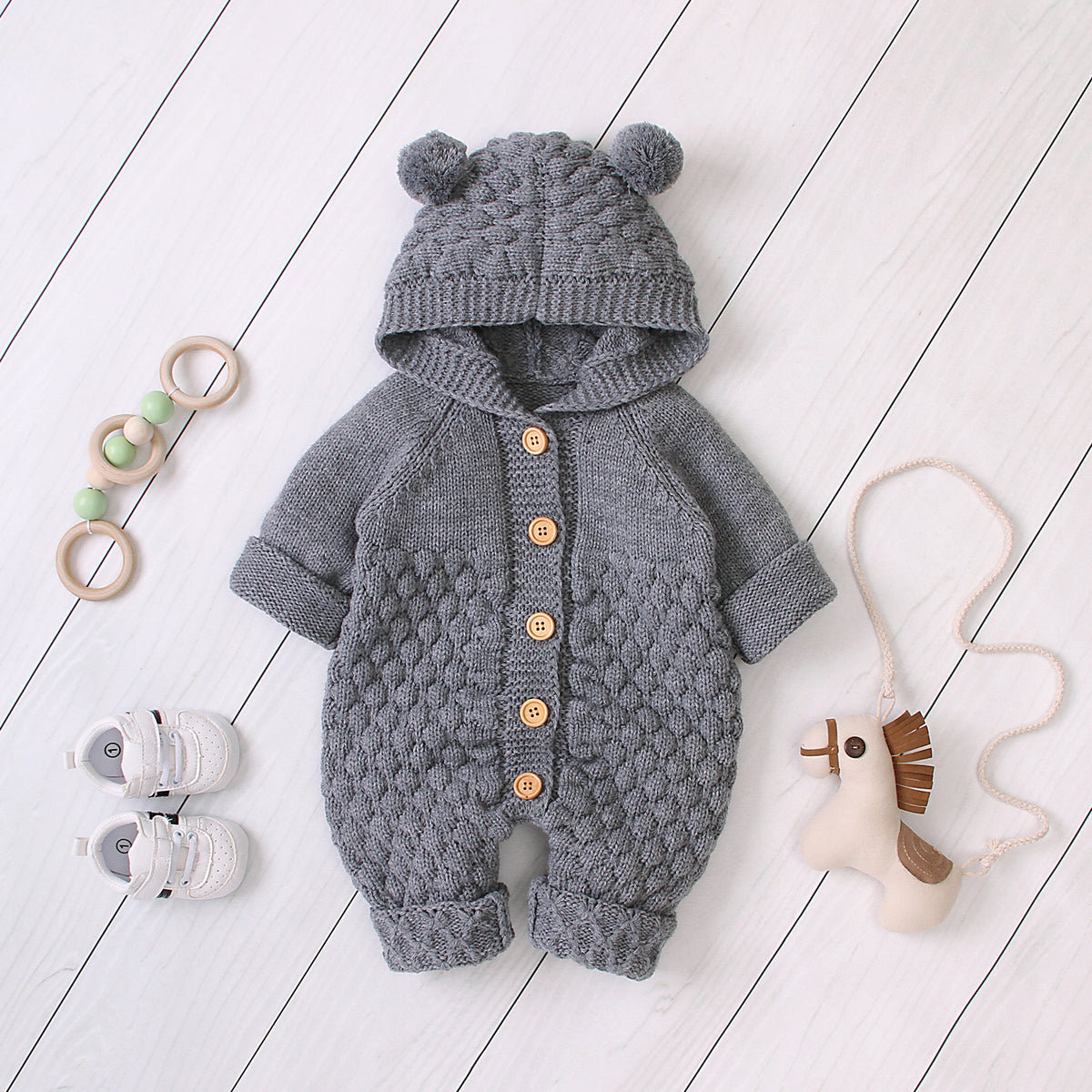 Combinaison en maille à capuche