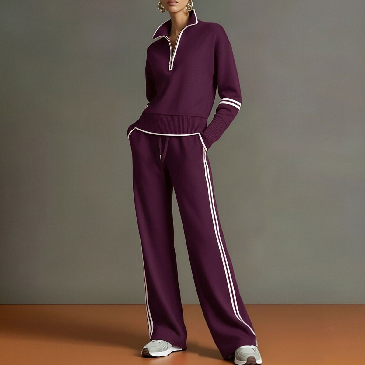 Conjunto de sudadera a rayas y pantalón de pierna ancha