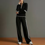 Conjunto de sudadera a rayas y pantalón de pierna ancha