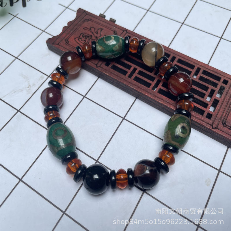 Tibetaanse Dzi-kralenarmband, Drie-oog