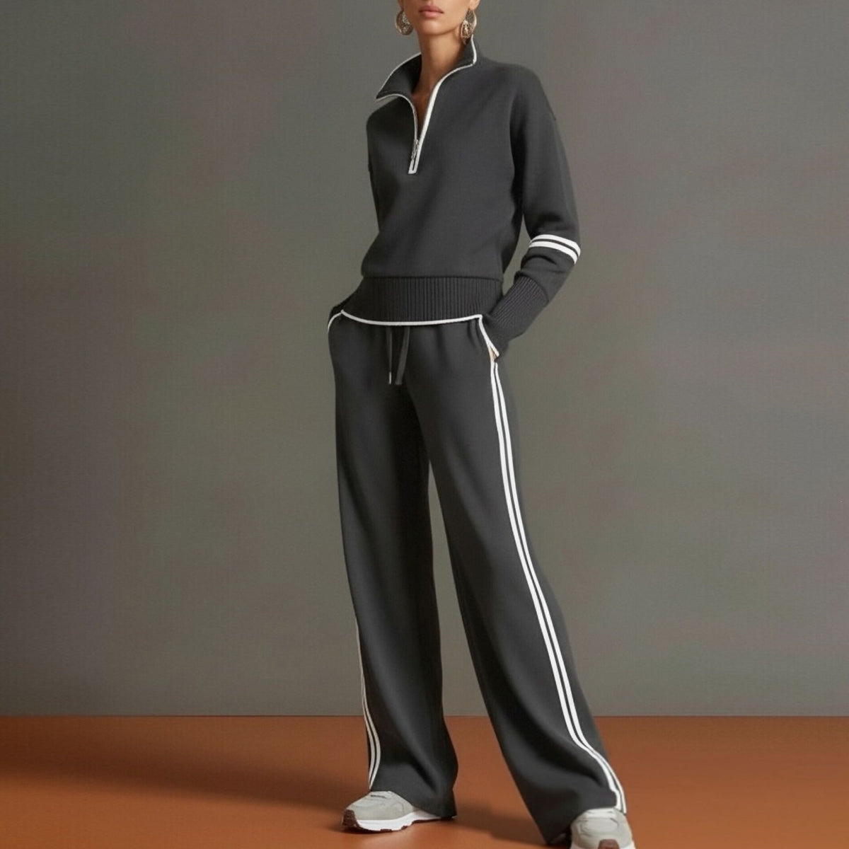 Conjunto de sudadera a rayas y pantalón de pierna ancha