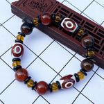 Tibetaanse Dzi-kralenarmband, Drie-oog