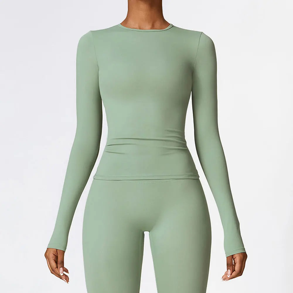 Haut de sport NCLAGEN pour femme, manches longues, idéal pour le fitness, la course et la salle de sport, vêtement d'entraînement respirant, à séchage rapide et hautement élastique.