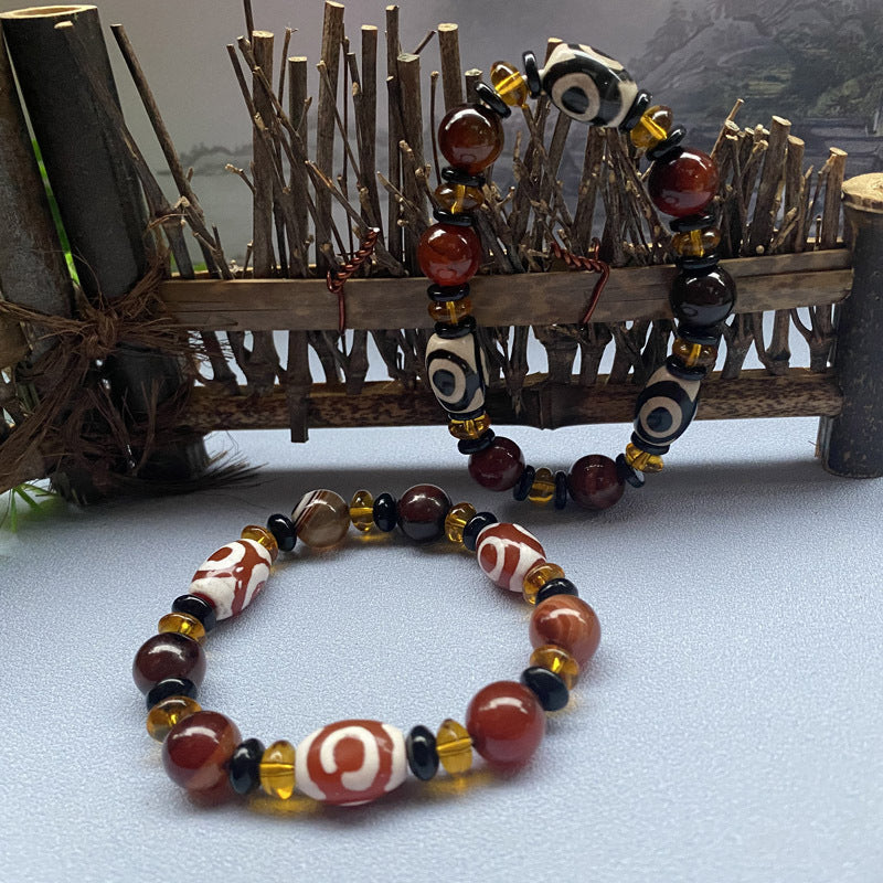 Tibetaanse Dzi-kralenarmband, Drie-oog