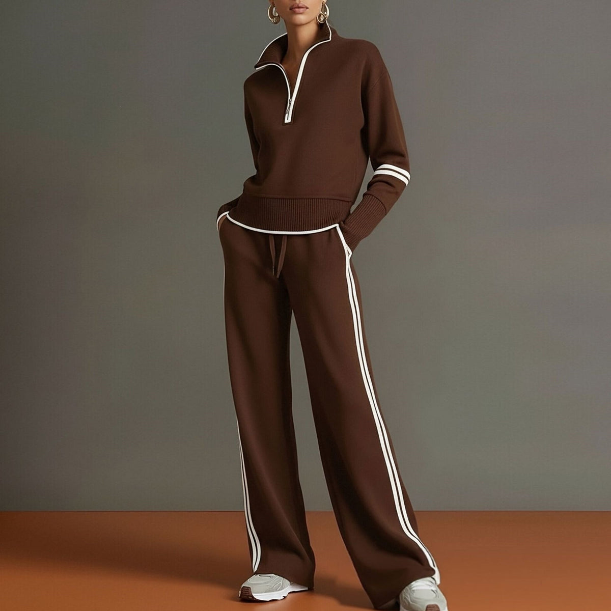 Conjunto de sudadera a rayas y pantalón de pierna ancha