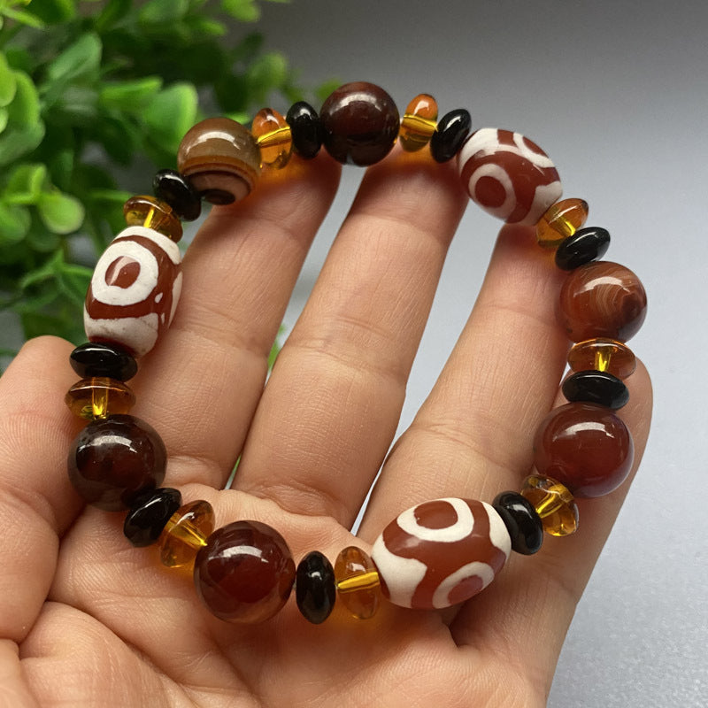 Tibetaanse Dzi-kralenarmband, Drie-oog